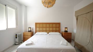 1 dormitorio, tabla de planchar con plancha, wifi gratis y ropa de cama