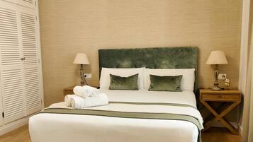 1 slaapkamer, een strijkplank/strijkijzer, internet, beddengoed