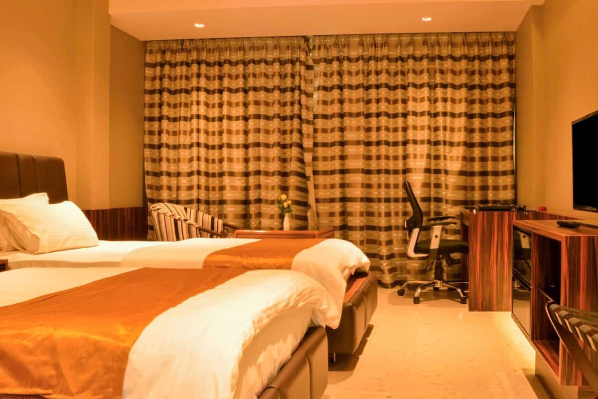 Egyptian cotton sheets, premium bedding, down duvets, minibar