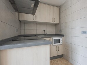 Fridge, microwave, coffee/tea maker, toaster