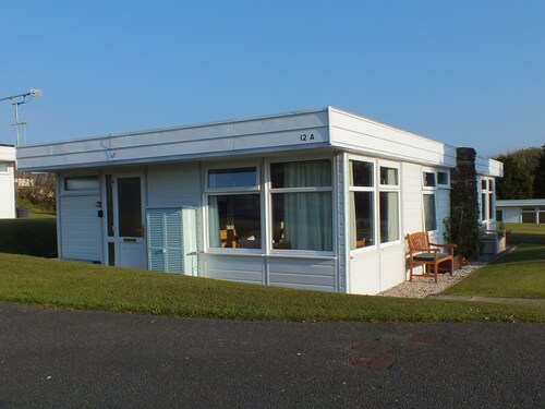  Chalet Cwtch, a cosy 5 bed holiday cottage in Roch, Pembrokeshire