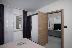 2 chambres, fer et planche à repasser, lit parapluie, Wi-Fi gratuit