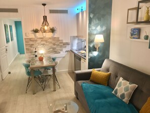 Familie appartement, uitzicht op zee, aan zee | Kamervoorziening