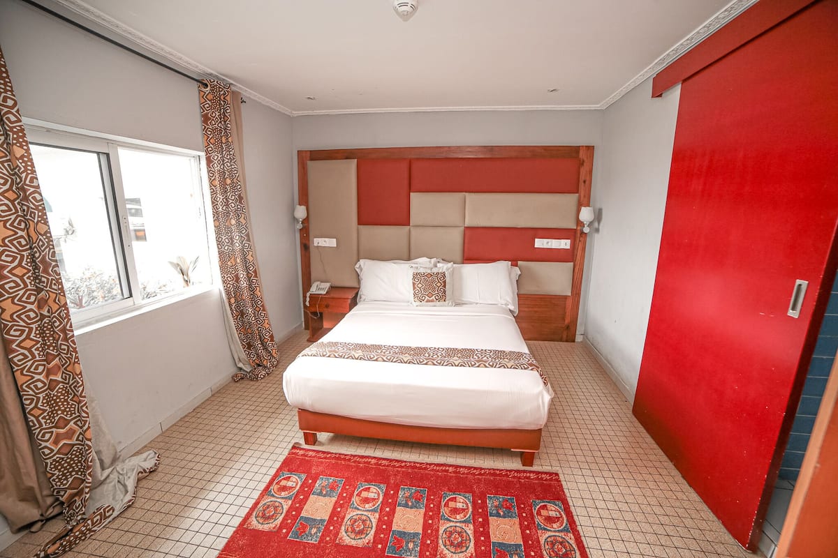 2 habitaciones, ropa de cama de alta calidad y minibar