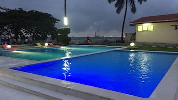 2 outdoor pools, open 9:00 AM to 7:00 PM, pool loungers