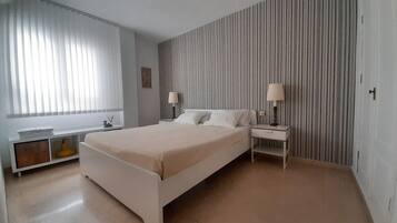 2 dormitorios, tabla de planchar con plancha, wifi y ropa de cama