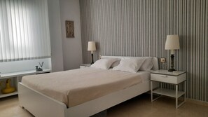 2 dormitorios, tabla de planchar con plancha, wifi y ropa de cama