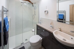 Shower, eco-friendly toiletries, hair dryer, towels