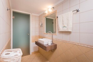 Shower, eco-friendly toiletries, hair dryer, towels