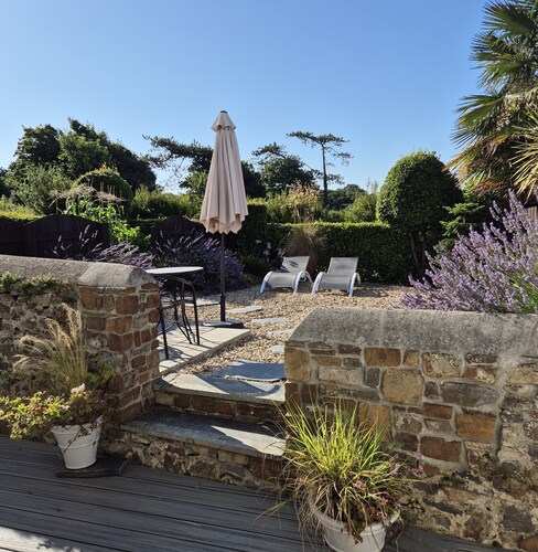 A luxurious spacious home, village location. 5 mins to the beach, EV Charger.