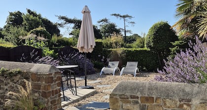 A luxurious spacious home, village location. 5 mins to the beach, EV Charger.