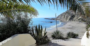 On the beach, sun-loungers, beach towels