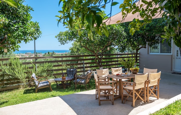 Outdoor dining - Ionian Bliss apartment with a stunning view to Alykes (Katastari)
