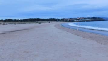 On the beach, sun-loungers, beach towels