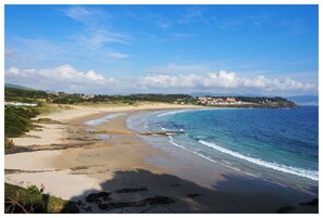 On the beach, sun loungers, beach towels
