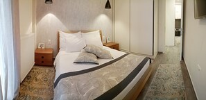 Apartamento luxo (Alpinia) | 1 quarto, ferros/tábuas de passar roupa, Wi-Fi de cortesia