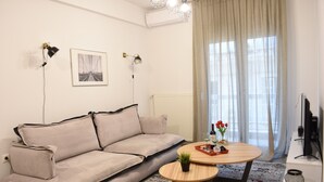 Leilighet – deluxe (Heliconia) | Oppholdsområde | Flatskjerm-TV