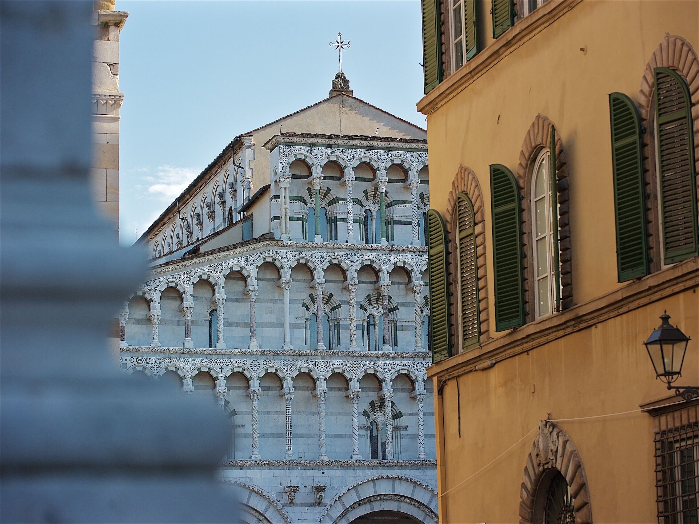 A building with intricate architectural details, including arches and columns.