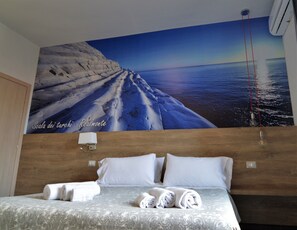 3 habitaciones, tabla de planchar con plancha, wifi y ropa de cama 