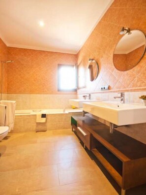 Bathtub, hair dryer, towels