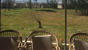 A view from a room with large windows overlooking a grassy area with trees and a body of water. - Superb Basque villa. Direct access to the sea. 7 bedrooms including 4 doubles. 12/13 p (La Tremblade)