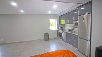 Fridge, oven, coffee/tea maker, toaster