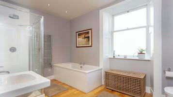 Bathtub, hair dryer, towels