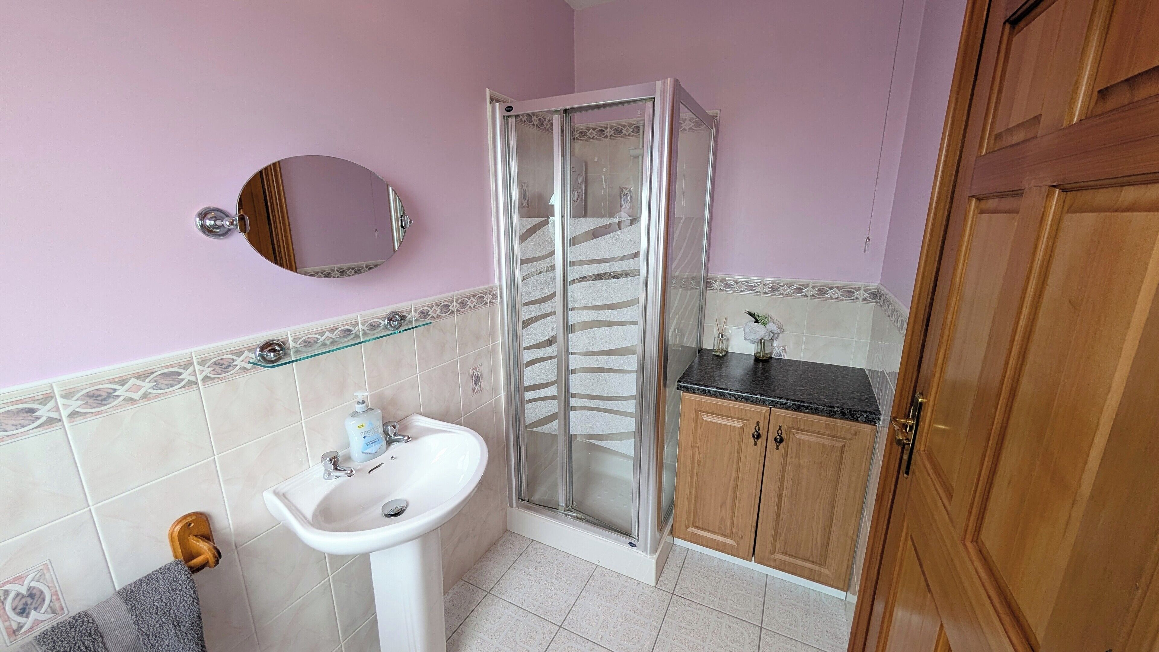 Bathtub, hair dryer, towels, soap