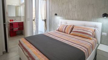 2 habitaciones, tabla de planchar con plancha y cuna de viaje