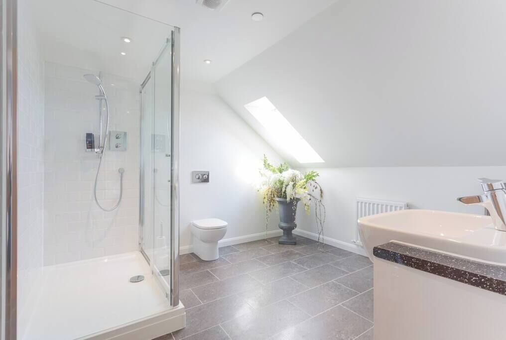 Bathtub, hair dryer, towels