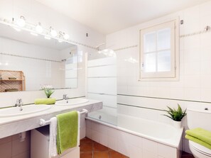 Shower, towels, toilet paper