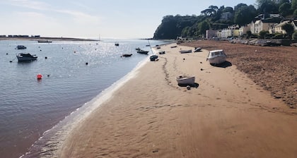 Village property with parking and sunny enclosed courtyard garden