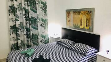 1 dormitorio, tabla de planchar con plancha, cuna de viaje y wifi