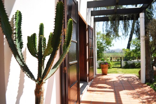 Plage et jardin de House of Joy