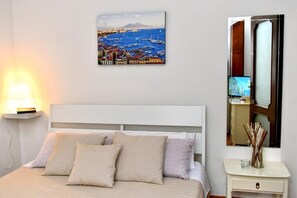 1 dormitorio, tabla de planchar con plancha, wifi gratis y ropa de cama