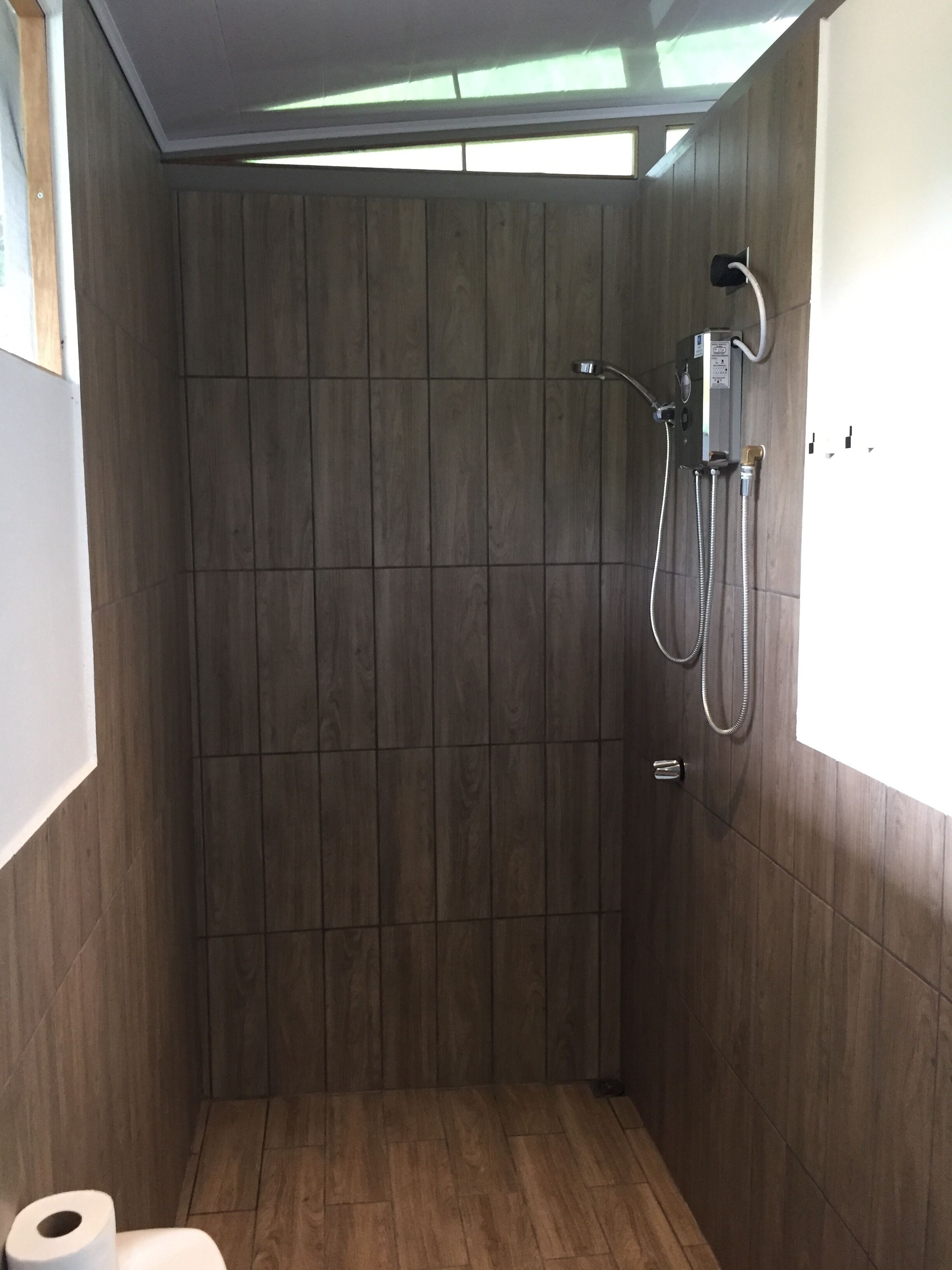 Shower, towels, toilet paper