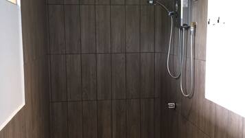 Shower, towels, toilet paper