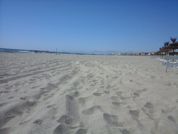 Beach nearby, sun loungers