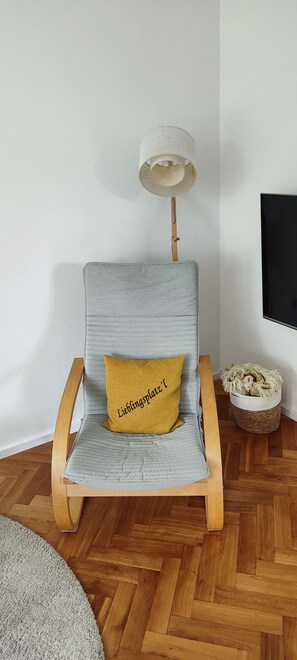 Relax in comfort with a plush chair and floor lamp.