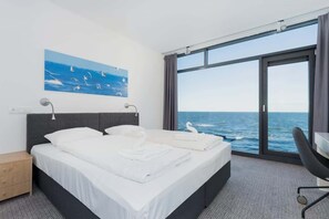 1 bedroom, desk, iron/ironing board, travel cot