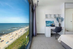 1 bedroom, desk, iron/ironing board, travel crib