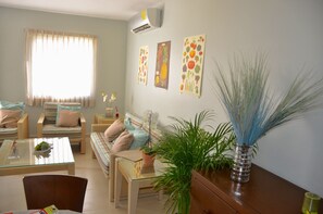 TV - New and unique semi-detached duplex in Puerto Morelos (Puerto Morelos)