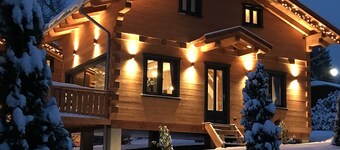 5 * log cabins with sauna, fireplace, terrace, barbecue etc. in alpine chalet style