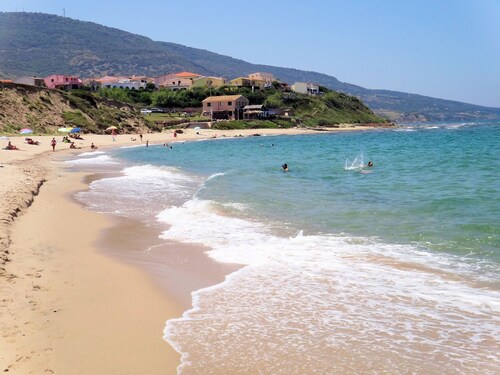 Holiday home on the sea in Sardinia - satellite TV, washing machine and sea view