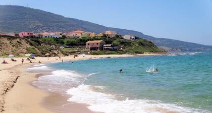 Holiday home on the sea in Sardinia - satellite TV, washing machine and sea view
