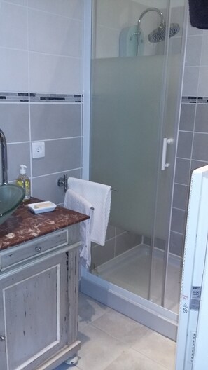 Shower, hair dryer, towels, soap