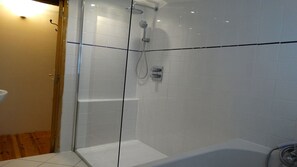 Bathtub, hair dryer, towels