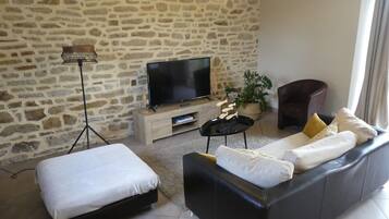 Flat-screen TV, video games, DVD player, books