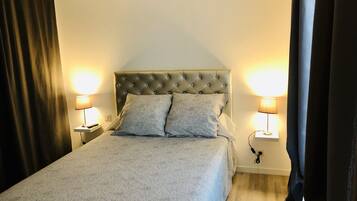 1 chambre, fer et planche Ă repasser, Wi-Fi gratuit, draps fournis