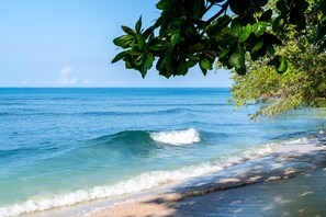 On the beach, sun loungers, beach towels